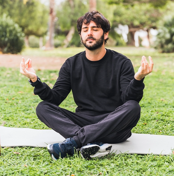 man doing yoga breathing