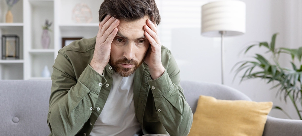 man in pain, sweating and anxiety