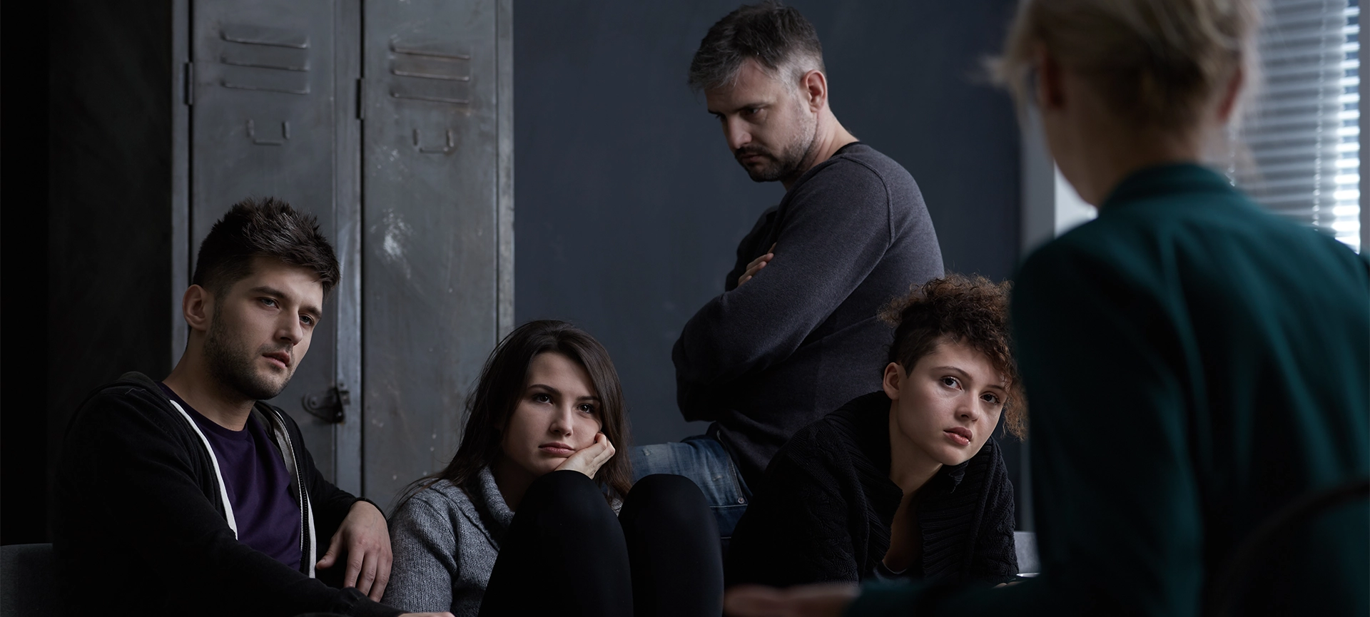 young people participating in group therapy for alcohol addiction