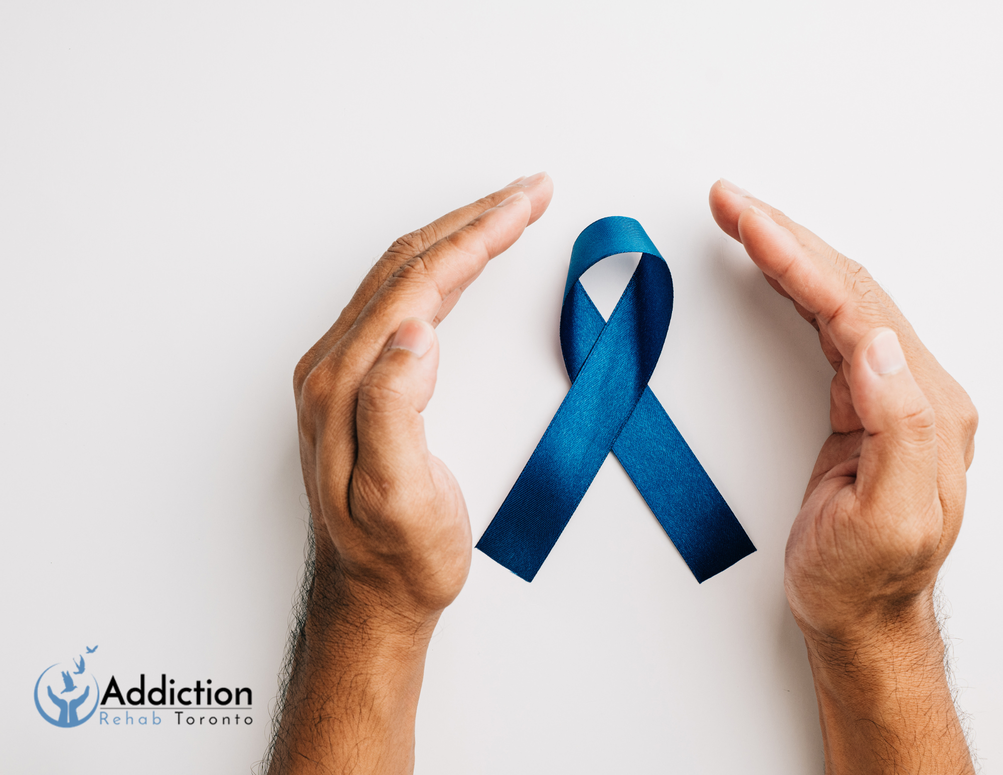 Blue awareness ribbon representing support for men’s mental health and addiction recovery.