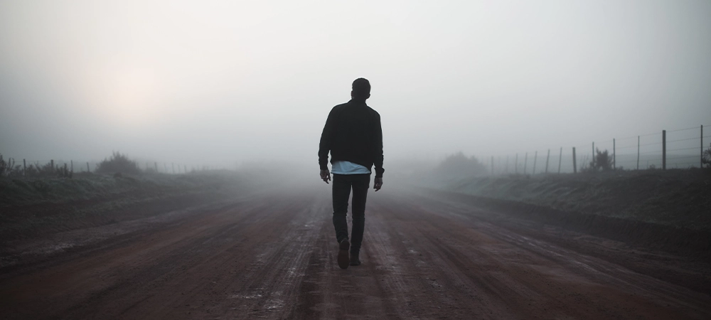 man leaving alone, walking on way